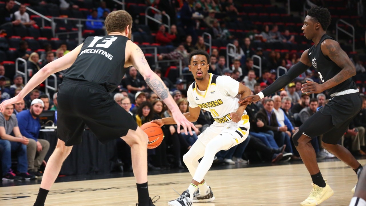 An NKU basketball player in action