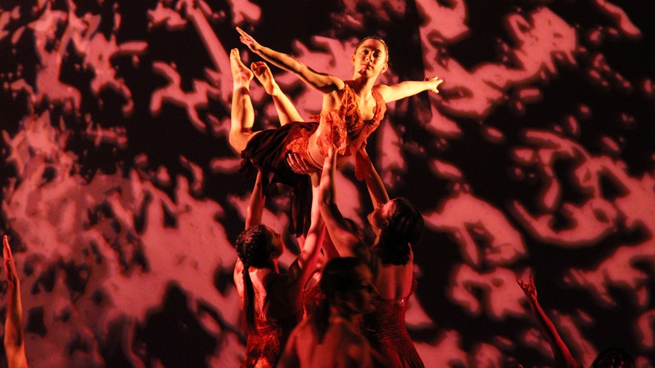 Dancer being held up