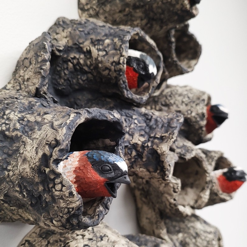 birds in wood openings