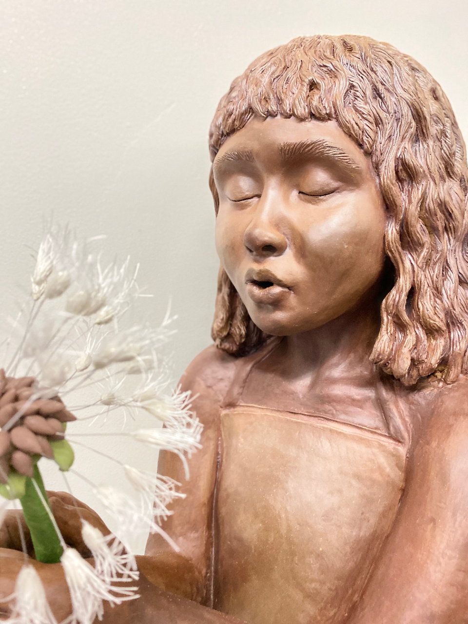 pear sitting in chair