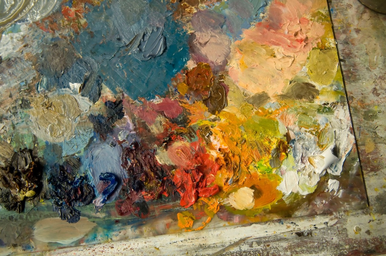 paint mixing together to make a variety of colors