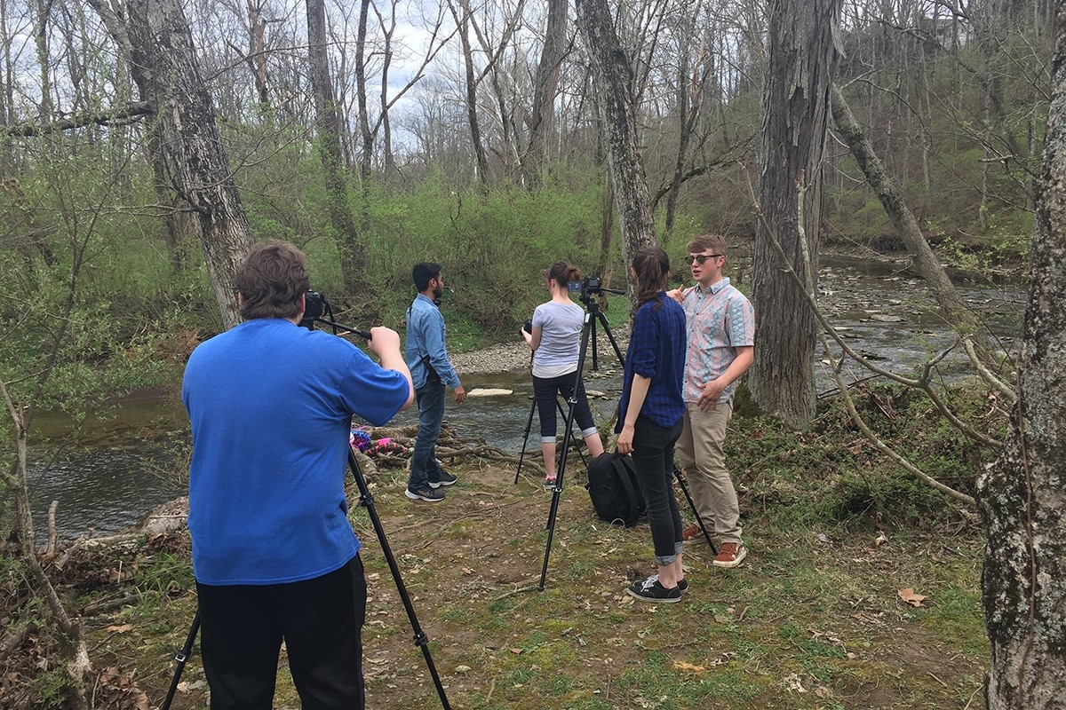 students on location for video shoot