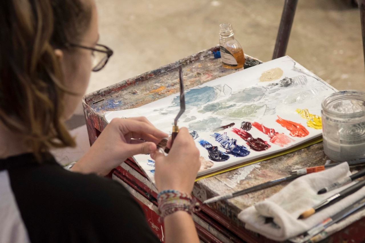 Student swatching paint 