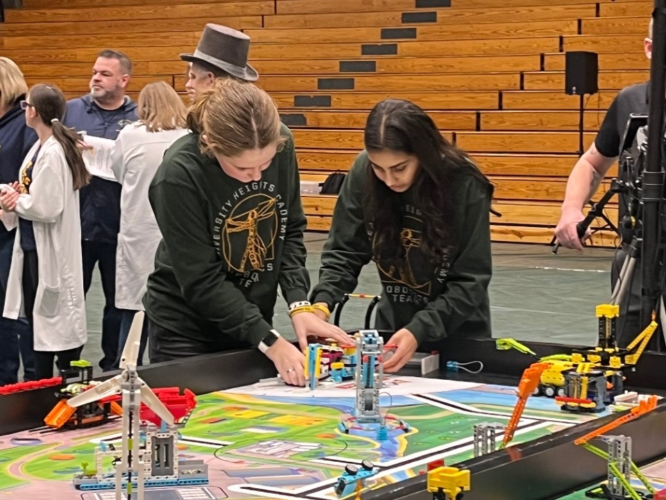 School-aged kids compete in the robot games at the FIRST LEGO League Championship Tournament