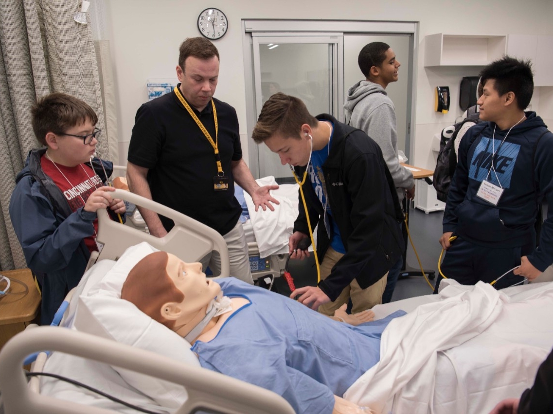 High school students experience a Northern Kentucky University nursing lab at High School STEM+H Day event