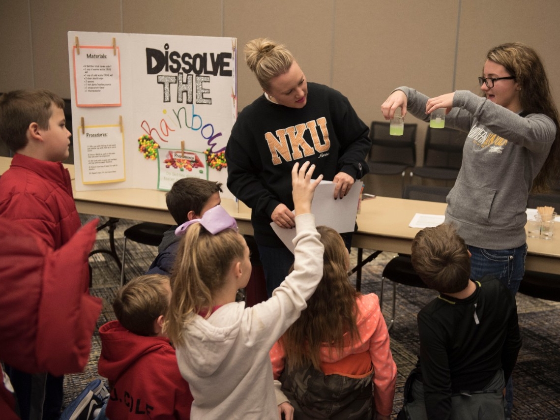 Student teachers teaching STEM subjects to elementary students