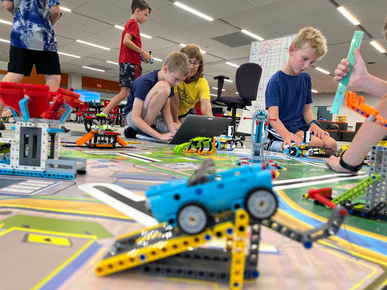 Kids program and test electronic LEGO creations