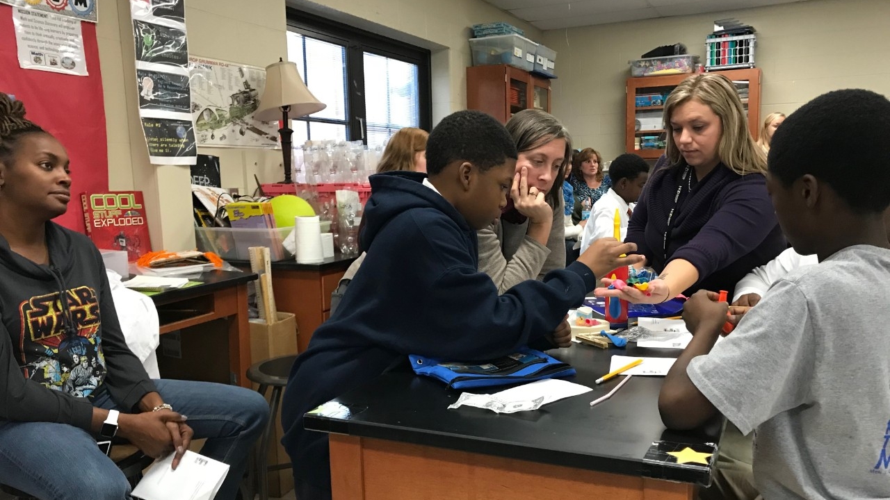 CINSAM Outreach Team leads STEM demonstration to middle school students while teachers observe as part of the Next Generation STEM Classroom.