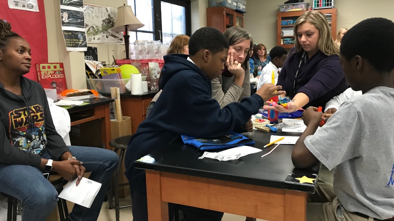 CINSAM Outreach Team leads STEM demonstration to middle school students while teachers observe as part of the Next Generation STEM Classroom.