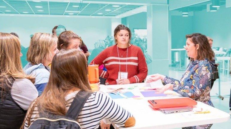 A teacher presents STEM education ideas to other teachers in a breakout session.
