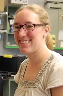 Photo of Dr. Shifley smiling in the lab.
