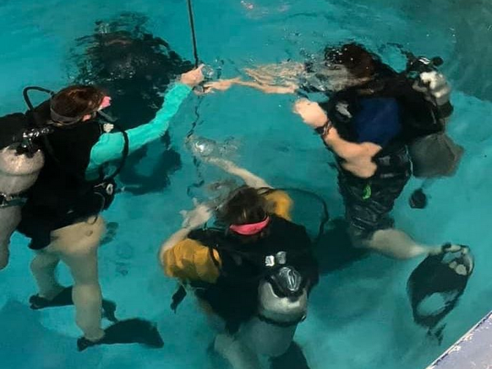 SCUBA Club members getting certified in the pool.