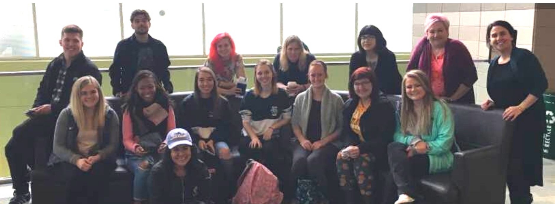 Image of students waiting in an airport to leave for Ireland