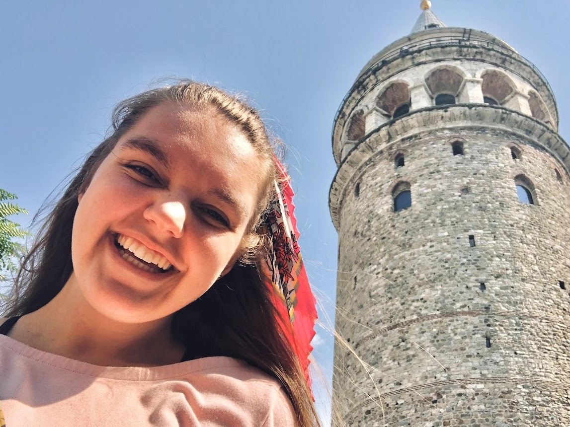 Student selfie next to a building in Istanbul