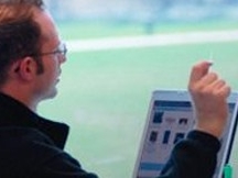 A person evaluating data on a computer