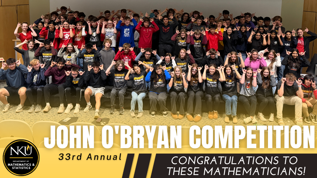 All 2025 competitors pose for a group photo while doing the "Norse Up" hand signal at NKU.