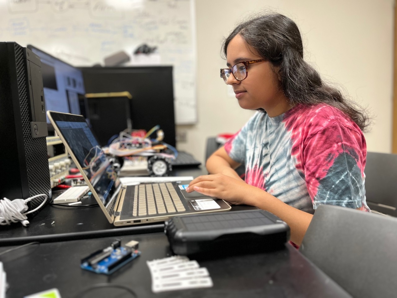 Engineering student doing summer research in the lab.