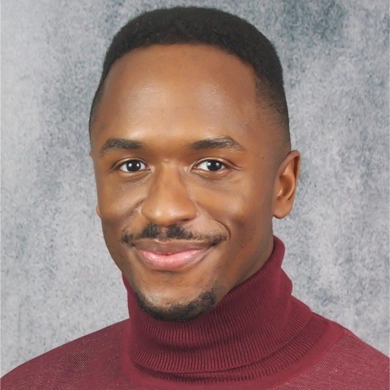 Marcus Alan McGhee headshot and vote buttons