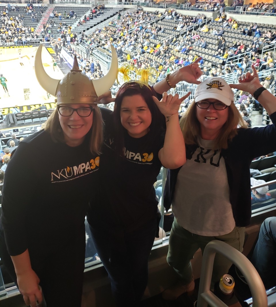 Dr. Julie Olberding, Missy Gish, Dr. Karen Miller Norsing Up at the Men's Basketball game on January 18