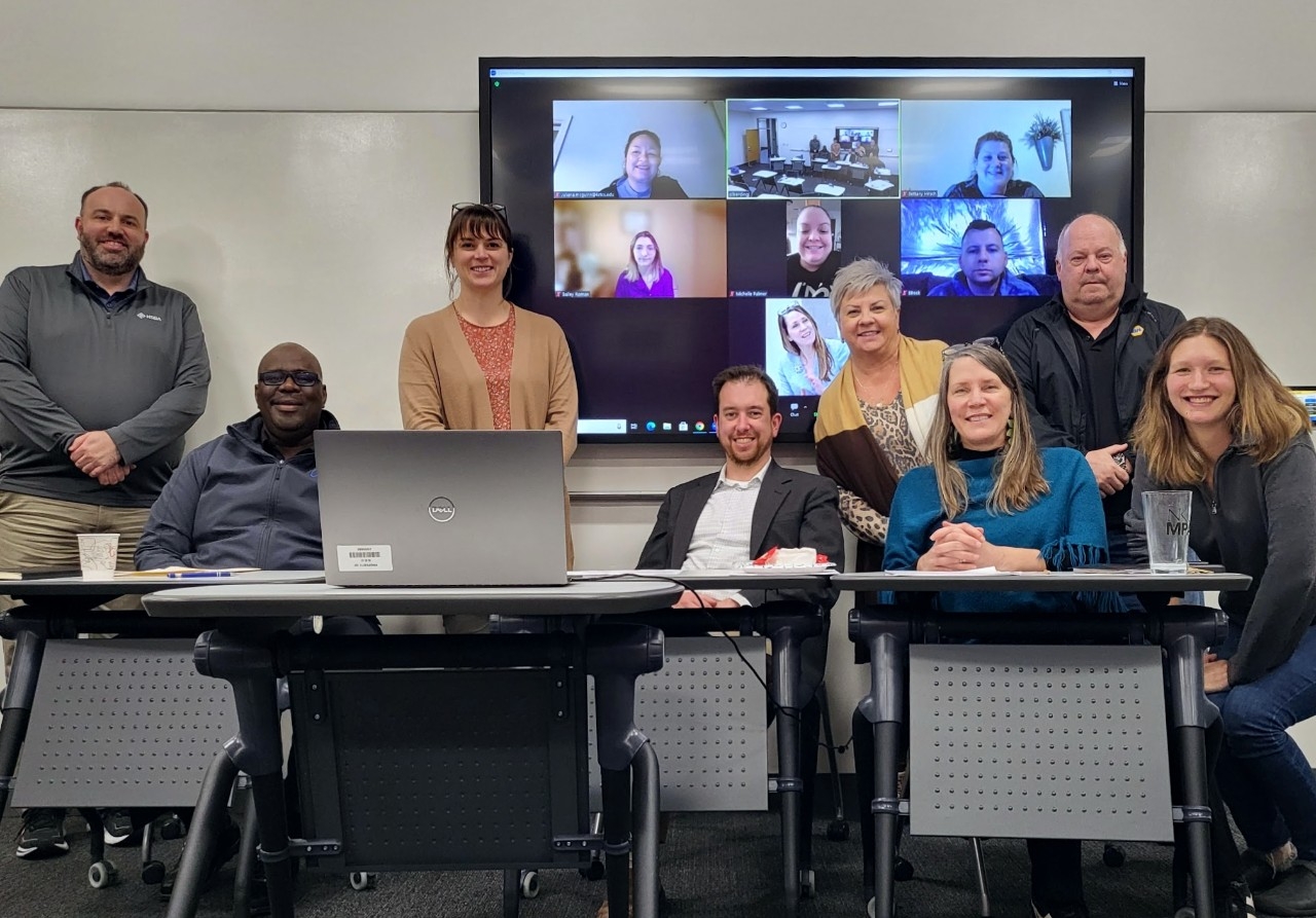 Capstone class with board members in classroom