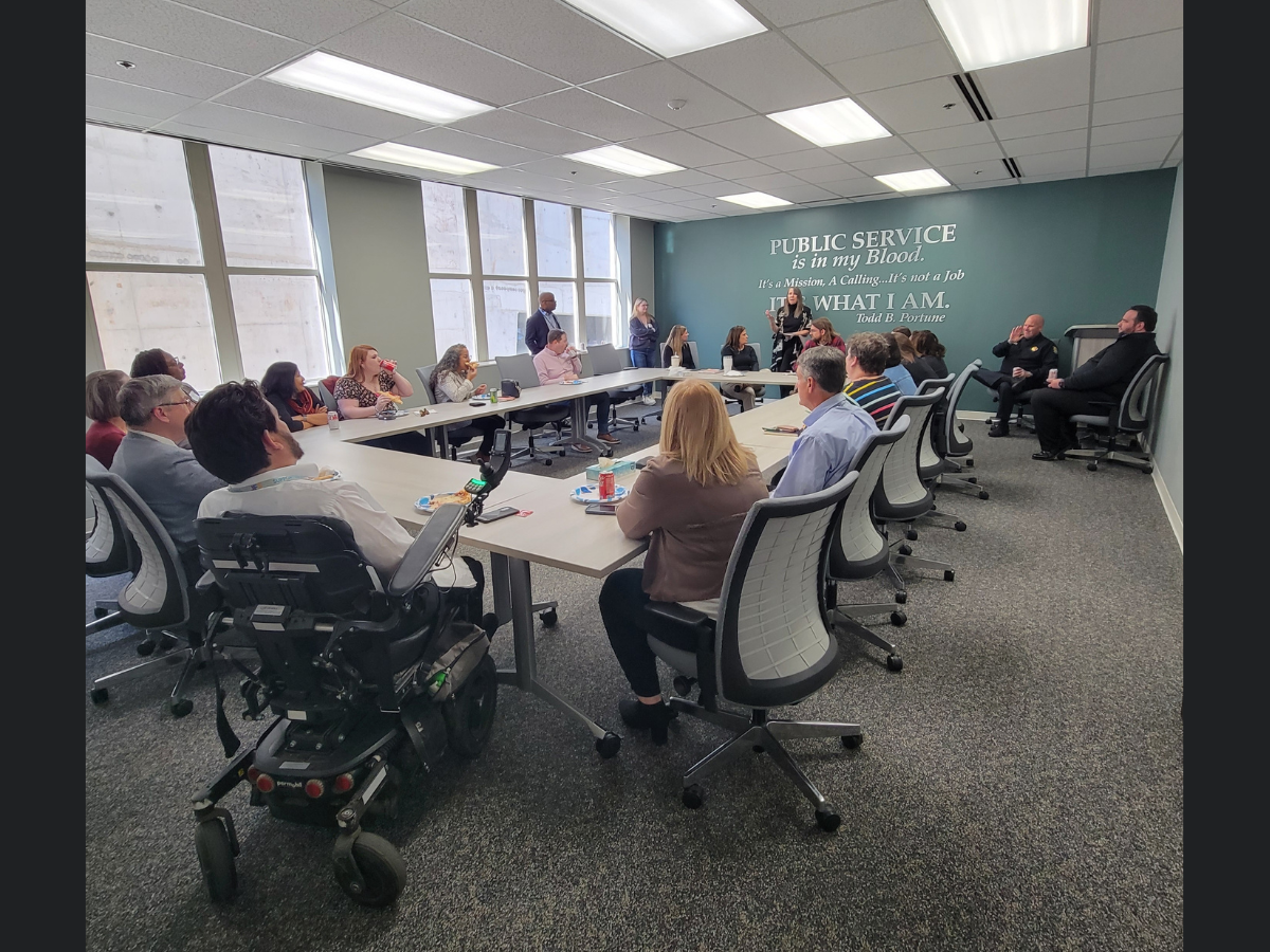 Conference room with Public Service in Action attendees
