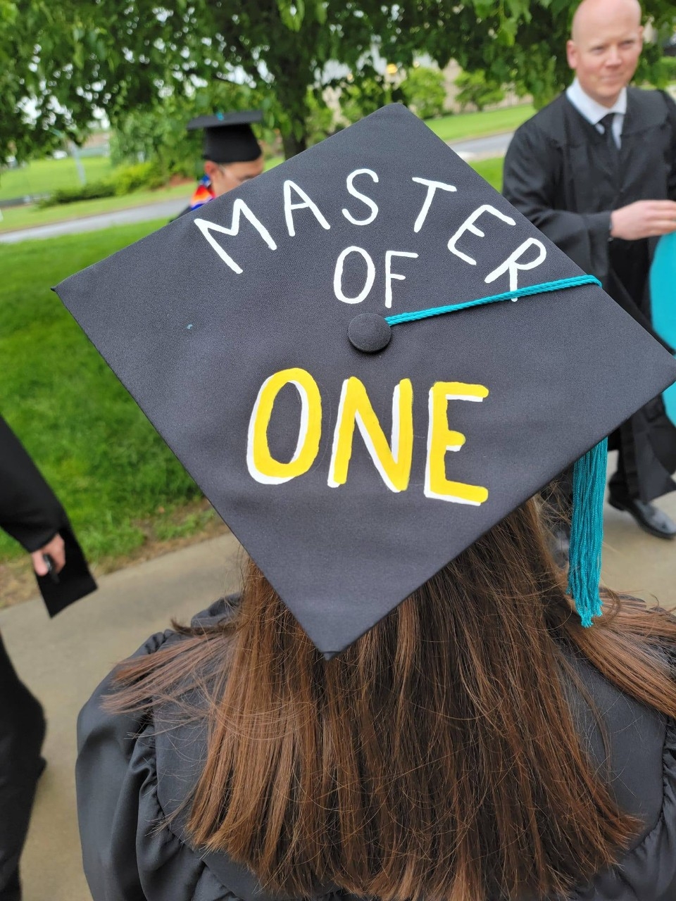 Top of cap saying Master of One