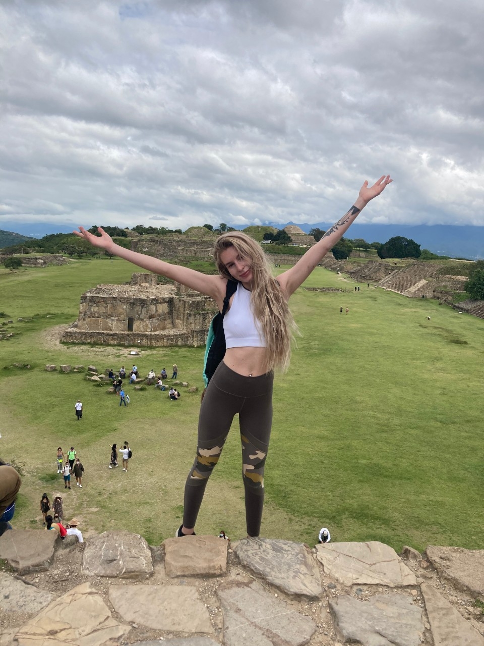 Cayla Cowens standing at ruins