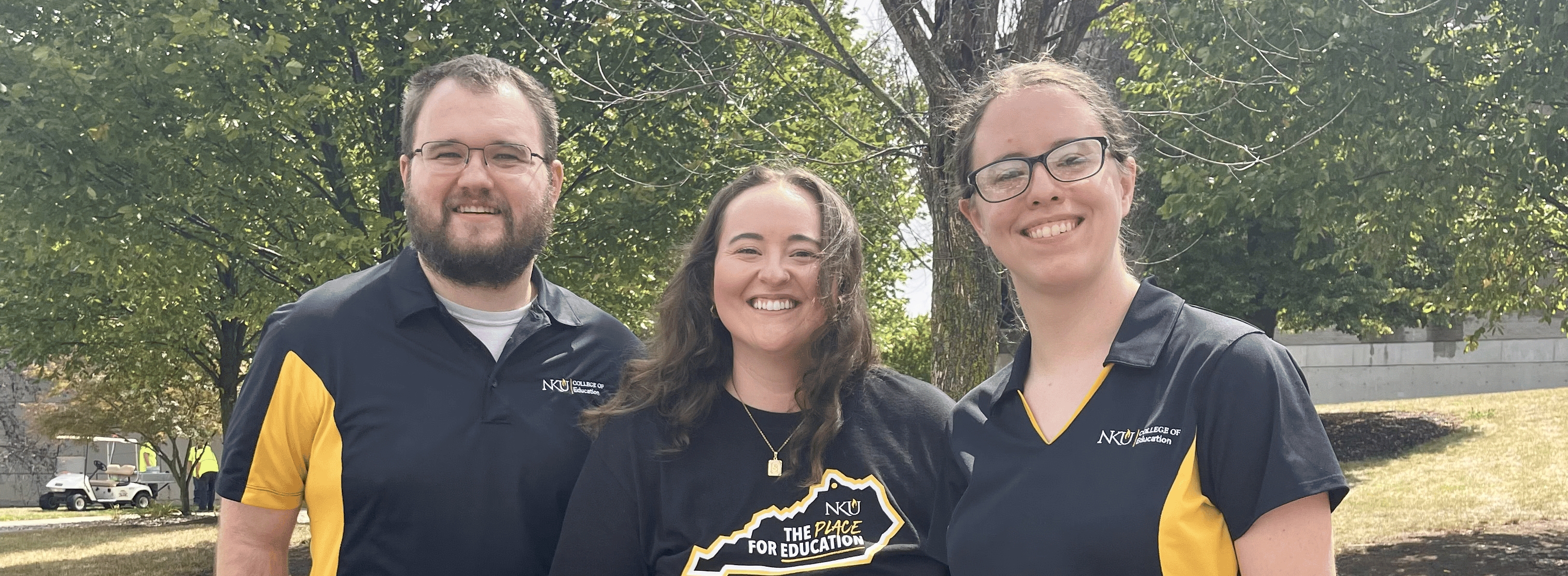 Advisor speaking with a student in an office.