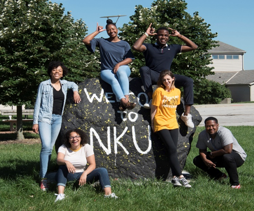 NKU ROCKS Students gathered around the rock in Norse Commons.
