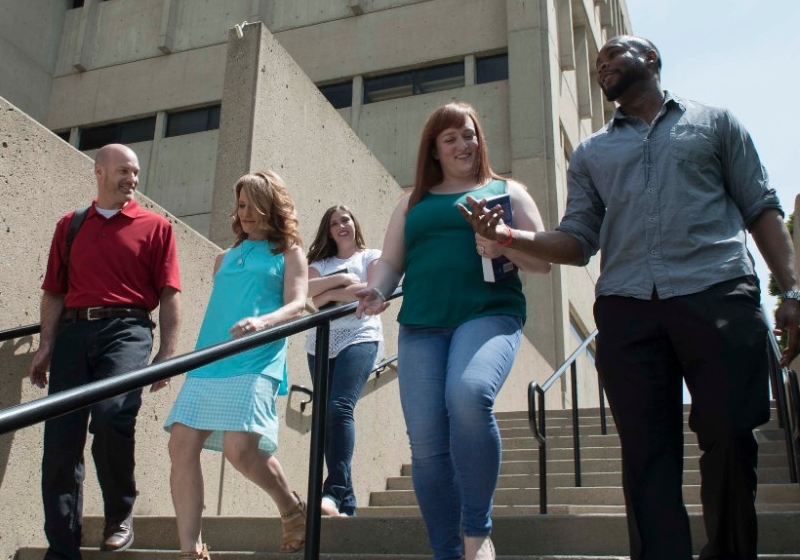Students walking down stairs