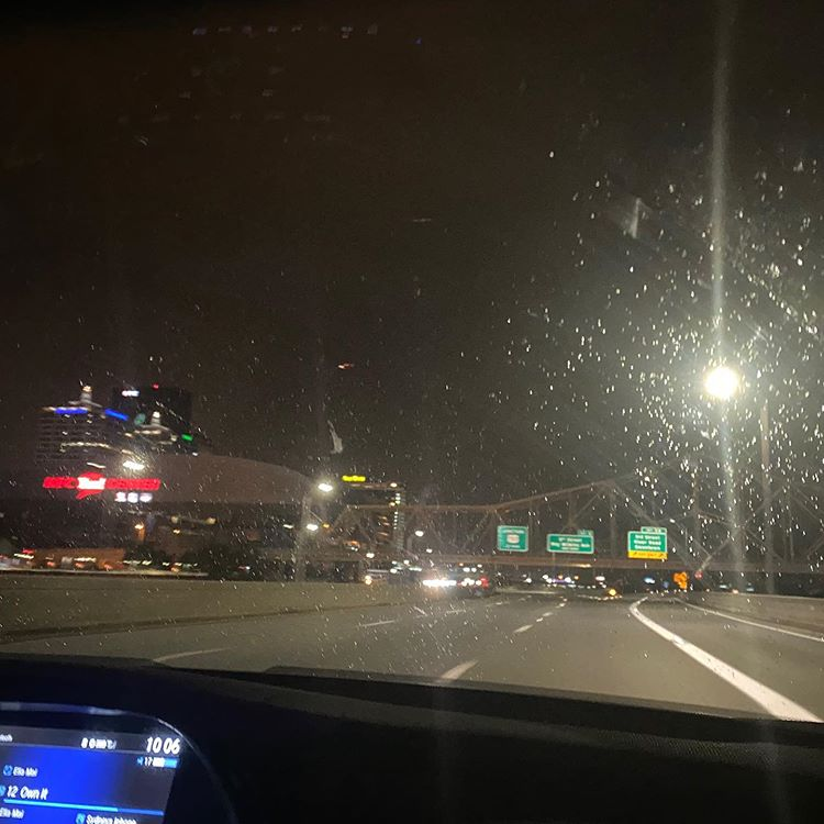 Humans of Greater Cincinnati Post: City skyline through a rainy windshield