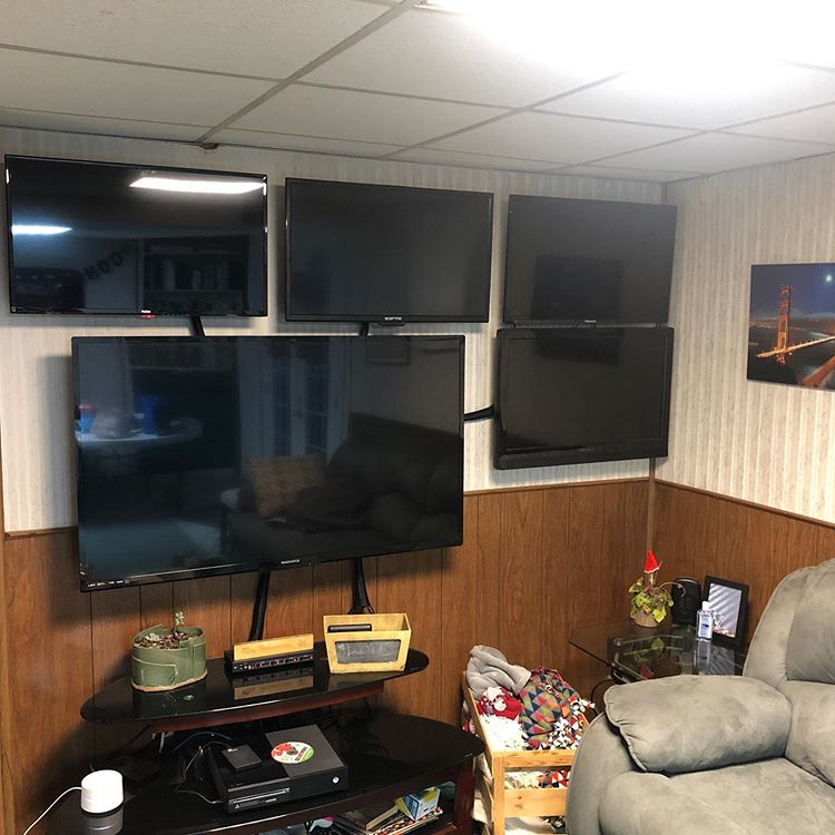 Humans of Greater Cincinnati Post: Living room with TVs mounted on wall