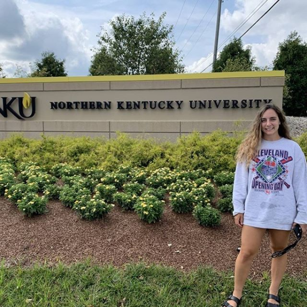 Humans of Greater Cincinnati Post: female student in front of NKU sign
