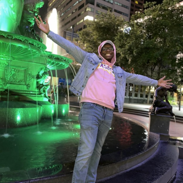 Humans of Greater Cincinnati Post: student in front of fountain at night
