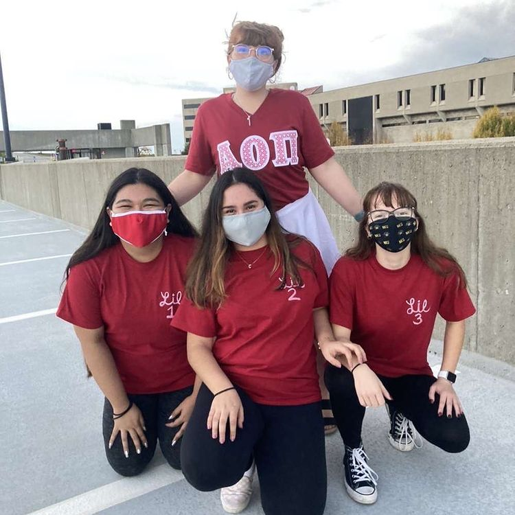 Humans of Greater Cincinnati Post: four female students in sorority t-shirts