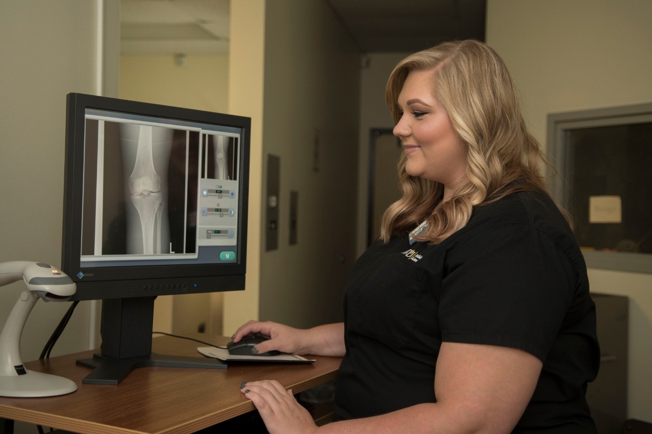 student with x-ray machine