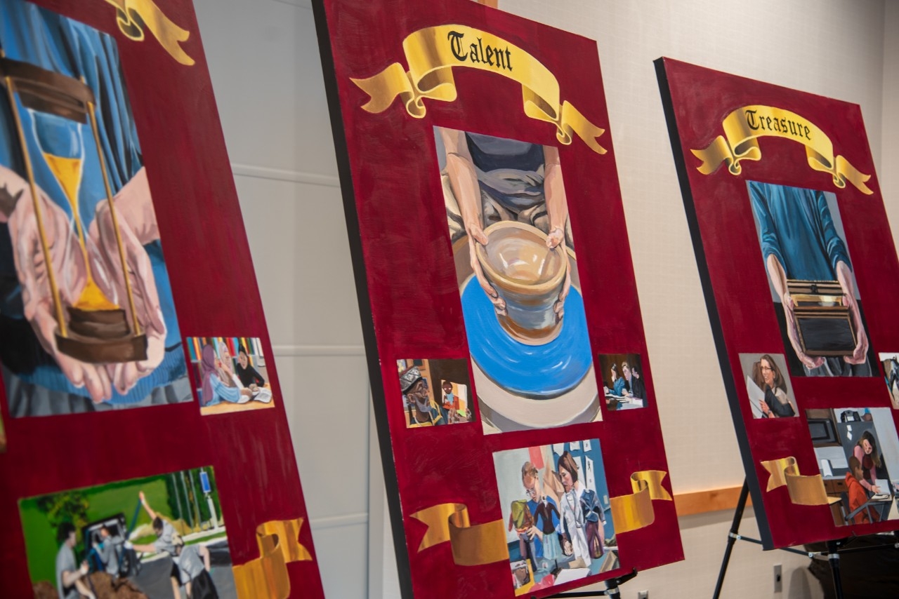 Members of the Saint Andrews Georgian UniversityNKU Master of Cybersecurity cohort pose for a photo with Theresa Payton, keynote speaker for the 17th annual Cybersecurity Symposium.