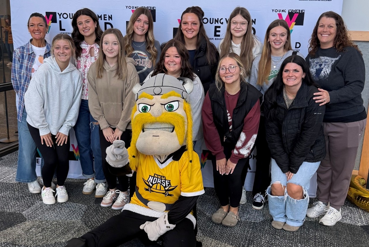 High school students from across the Northern Kentucky region pose with NKU's Victor Viking at the LEAD Teen Leadership Summit.