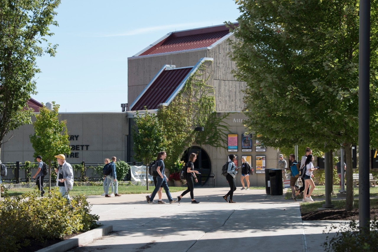Students walk through the Student Union Plaza to get to class. 