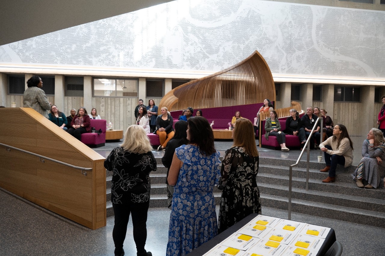 faculty and staff gathered at an event