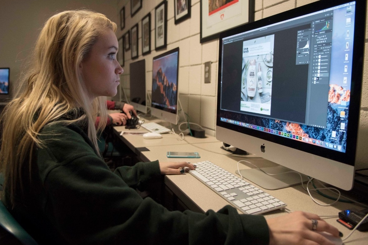 student working in a computer lab